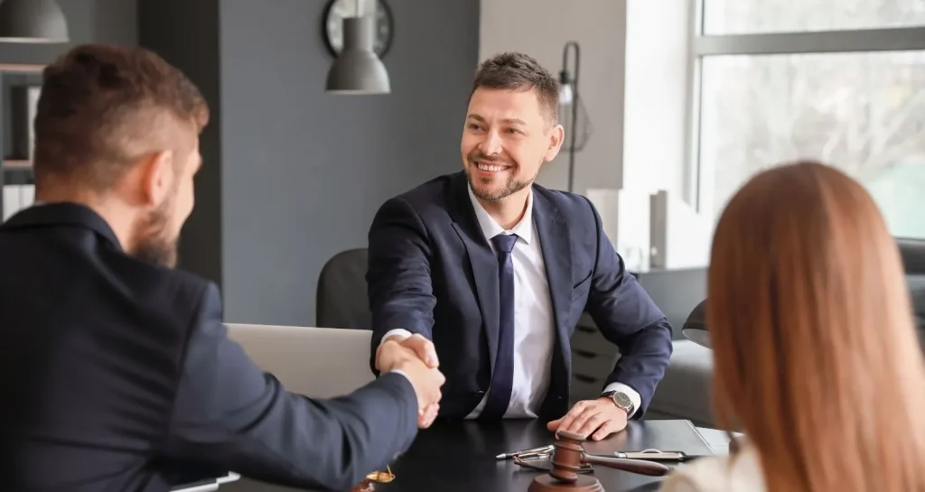 A boy shake hand shake with girl